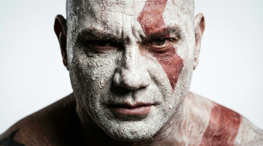 Close up of Dave Bautista as Kratos in God of War showing poor quality makeup texture.