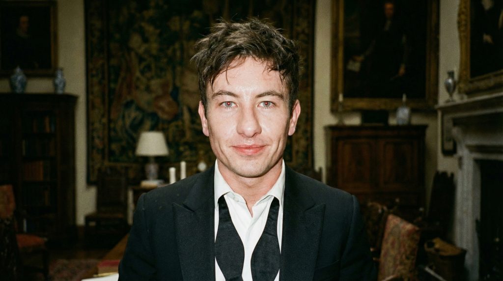 Barry Keoghan as Oliver Quick staring intensely in a tuxedo.